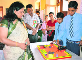 DDC Nirmal Sharma inspects stalls put up at the 2nd District-Level Science Exhibition at Boys Higher Secondary School, Reasi, on Tuesday. 