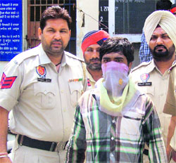 The accused in police custody in Ludhiana on Tuesday.