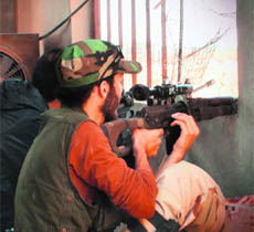 Alleged Free Syrian Army militants in Qusayr, Syria. 