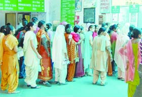 Senior citizens have to stand in the same queue along with others at government hospital in Amritsar
