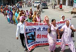 Members of the AIE Teachers Union take out a rally in Bathinda on Wednesday. They were demanding admision to the ETT course for the 2012-14 academic session