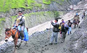Pilgrims heading for the Amarnath cave shrine on Wednesday