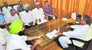 Farmers at a meeting with  Agriculture Minister Gulam Hassan Mir in Jammu on Wednesday. 