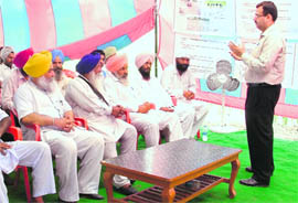 Farmers at a programme on direct seeding methodology near Ludhiana. 
