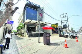 Barricades outside a restaurant at Ghumar Mandi. 