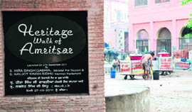 Lemonade vendors park their rehris inside the gate of the Twon Hall in Amritsar. 
