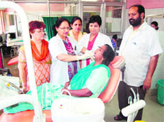 A patient being examined during the dental fortnight organised at Jallianwala Bagh Memorial Civil Hospital in Amritsar on Thursday.