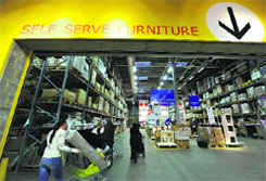 Shoppers push trolleys into Ikea's self service area in west London in this October 2010 file photo.
