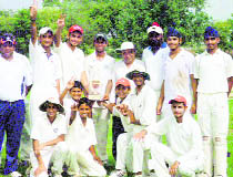Members of Black Elephant Cricket Club with the trophy in Patiala on Thursday . 