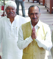 Congress MPs Jai Prakash Agarwal and Mahabal Mishra come out of Parliament after casting their votes in the presidential election in New Delhi on Thursday