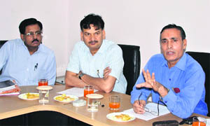 GP Patel, Managing Director, UJVNL, addresses a press conference in Dehradun on Thursday.