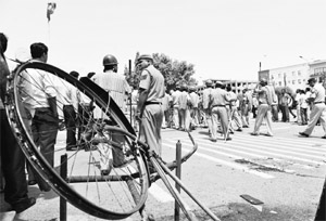 A strong police force guards Marutis Manesar plant on Thursday