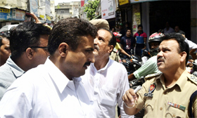 A tussle between two shop owners leads to tension and traffic chaos near Panj Peer Chowk in Jalandhar on Thursday.