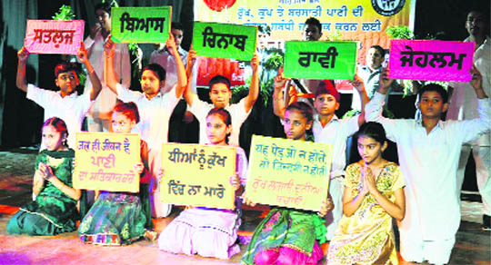 Fight foeticide Schoolchildren hold placards during an awareness programme against female foeticide, organised by Sarhad-e-Punjab Sports Club, in Amritsar on Friday.