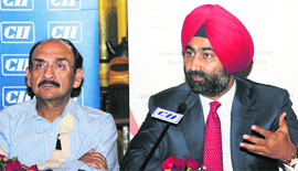 Confederation of Indian Industry vice-president and DCM Shriram Consolidated chairman & senior MD Ajay S. Shriram, head of Invest North 2012, (L) and CII Northern Region chairman and Fortis Healthcare executive chairman Malvinder Mohan Singh at the Invest North 2012 conference in New Delhi on Friday. 
