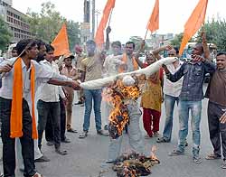Activists of Shiv Sena (Hindustan) burn an effigy of the PUDA and the local administration on Friday
