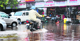 Rainwater accumulated at the Sector 28 market making it difficult for residents to move.