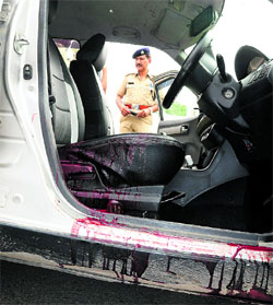 The blood spattered car in which Samoun Masih shot himself after shooting at his second wife in Sector 44, Chandigarh, on Friday.