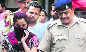 Accused Vajinder and Renu being produced in court.