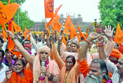 Activists of various Hindu organisations shout slogans during a demonstration at the Red Fort against the construction of a mosque at Subhash Park near Jama Masjid in Delhi on Friday.