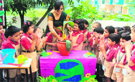 Student of Delhi Public School participate in Planet Pals Week in Dehradun on Friday.
