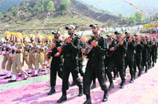 Commandos from the Jammu and Kashmir Armed Police participate in the