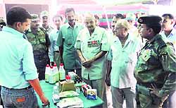 S Rama Krishna, Commanding Officer, 58 RR, inspects stalls at a rally for ex-servicemen at Talwara on Friday