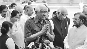 NDAs vice-presidential candidate Jaswant Singh (C), along with Sushma Swaraj (L), Harsimrat Kaur Badal (2L), LK Advani (2R) and Sharad Yadav (R), addresses mediapersons after filing his nomination in New Delhi on Friday. 