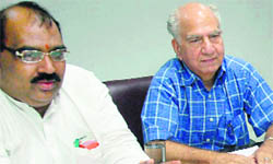  Ashwani Sharma and (right) Shanta Kumar at BJP office in Chandigarh on Friday. 