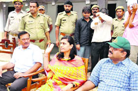 SSP (STF) Sweety Aggarwal and Rajaji National Park Director P Subuddhi address mediapersons in Haridwar on Saturday. The accused standing behind are covering their faces with hands. 
