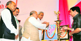 BJP organisational secretary Ram Lal and Chief Minister PK Dhumal during the BJP state executive meeting in Mandi on Saturday.