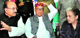 AICC general secretary Digvijay Singh (centre) with Congress state president Kaul Singh and Leader of the Opposition Vidya Stokes in Shimla on Saturday.
