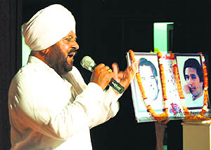 Folk singer and Congress MLA Mohammad Sadiq pays musical tributes to Rajesh Khanna and Dara Singh during a function in Amritsar on Saturday