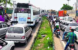A view of traffic jam on the Tawi flyover in Jammu on Saturday