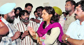 SDM-II Isha Kalia interacts with residents of Abadpura after reports of spread of diarrhoea in Jalandhar on Saturday.