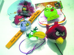 Rakhis based on the theme of Angry Bird game selling like hot cakes at a store in Ghumar Mandi.
