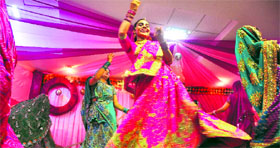 Members of a ladies club perform Gujarati dance to celebrate Teej in Ludhiana.
