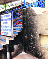 A garbage burning point near the foot overbridge at the Ludhiana railway station.