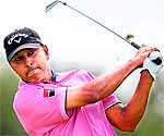 Jeev Milkha Singh plays a shot off the third tee during the third round of the British Open Golf Championship on Saturday