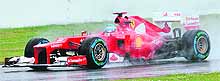 Ferraris Fernando Alonso drives during the qualifying session at the Hockenheimring circuit ahead of the German Formula One GP on Saturday