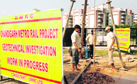 Work on the metro project in progress in front of the gurdwara at Sohana in Mohali on Sunday.