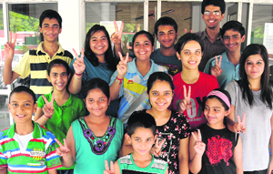 Winners of the Chandigarh State Ranking Table Tennis Tournament pose for photographers at Sector 23