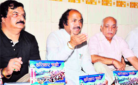 Members of the All-India Multan Youth Organisation give information about Multan Joth Festival in Haridwar on Sunday.
