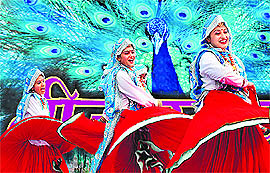 Artists present a Haryanavi dance during Teej celebrations at Haryana Raj Bhawan in Chandigarh on Sunday.