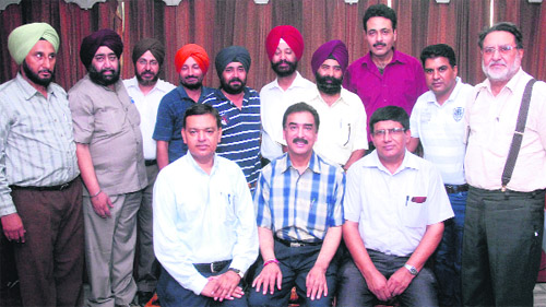 DD Jalandhar Director Dr Om Gauri Dutt Sharma (sitting in the centre) along with his team at a press conference regarding the music reality show in Jalandhar on Sunday.