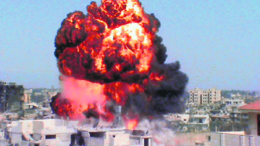 An image grab shows an explosion in the central Syrian city of Homs on Sunday