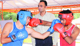 Boxers trade punches during trials for selecting citys boxing team at PMLSD Public School.