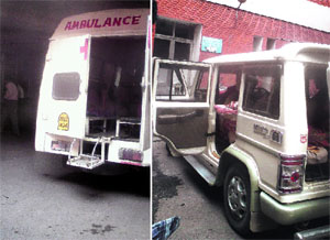 An ambulance and a private vehicle with patients lying inside stationed outside the Emergency ward gate of the PGI while attendants search for trolleys to take patient inside.