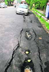The newly constructed Prof Mohan Singh Road which caved in Ludhiana on Monday.