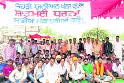 Vegetable vendors stage a protest at Khanna. 